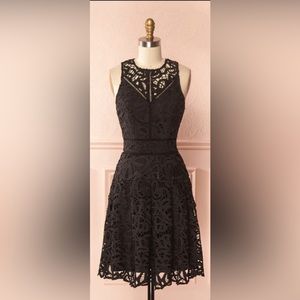 Adelyn Rae Dress. Beautiful black lace crocheted dress with a fitted bodice.